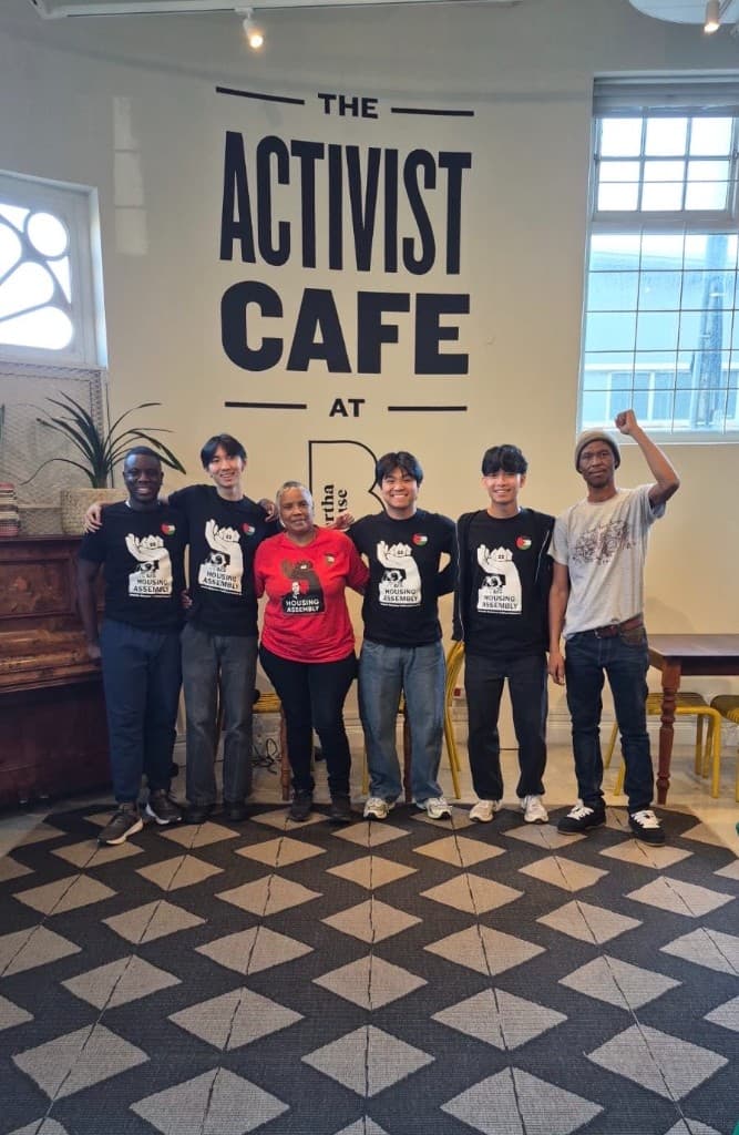 The team with Housing Assembly staff at the Activist Cafe